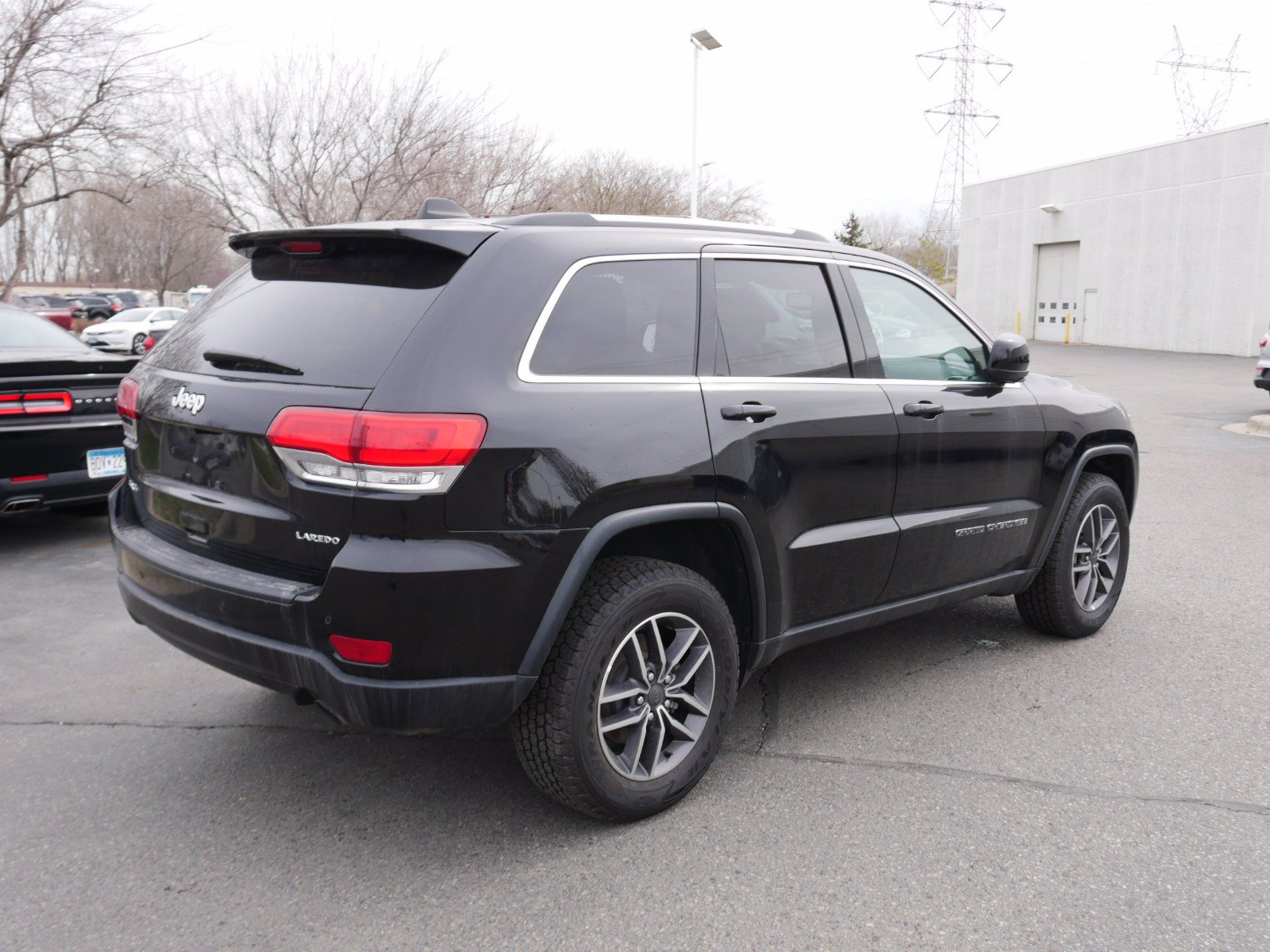 Pre-Owned 2019 Jeep Grand Cherokee Laredo E 4WD Sport Utility