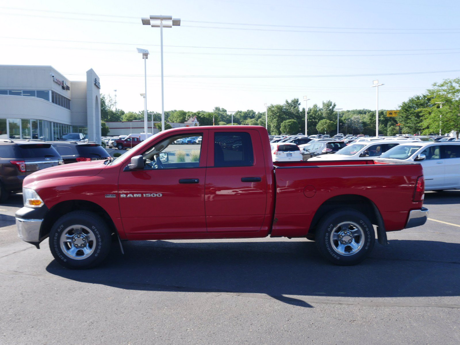 Pre-Owned 2011 Ram 1500 ST 4WD Crew Cab Pickup